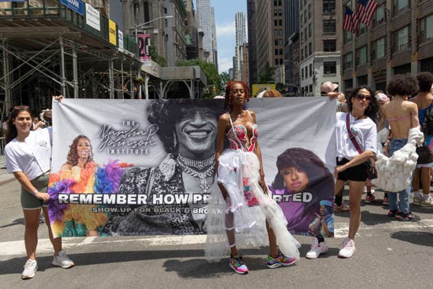 June 28, 2026, New York, New York, USA: Participants hold a banner for the Marsha P. Johnson Institute at the 57th annual NYC Pride March as it proceeds down Fifth Avenue from Midtown to Greenwich Village. The theme For All of Us honors the legacy of activist Marsha P. Johnson. New York USA - ZUMAr174 20260628_znp_r174_012 Copyright: xGinaxMxRandazzox