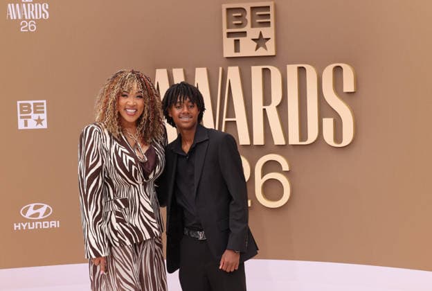 (L-R) Kym Whitley and Joshua Whitley arrive on the red carpet for 26th annual BET Awards live telecast at the Peacock Theater in Los Angeles on Sunday, June 28, 2026. The BET Awards honors Black entertainers and other people of color in music, film, sports and philanthropy.  LAP20260628189 GREGxGRUDT