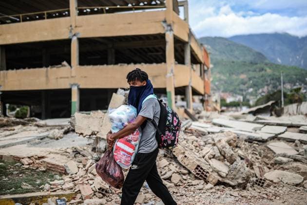 Daily life continues in La Guaira amid search and rescue efforts after Earthquakes LA GUAIRA, VENEZUELA - JUNE 28: A general view of daily life as search and rescue operations continue for survivors trapped under collapsed buildings following two powerful earthquakes, in the coastal state of La Guaira, Venezuela on June 28, 2026 Cem Tekkesinoglu Anadolu La Guaira Venezuela. Editorial use only. Please get in touch for any other usage.  Copyright: x2026xAnadoluxCemxTekkesinoglux