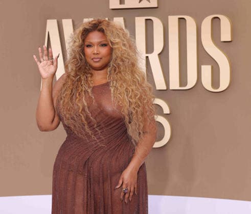 Lizzo arrives on the red carpet for 26th annual BET Awards live telecast at the Peacock Theater in Los Angeles on Sunday, June 28, 2026. The BET Awards honors Black entertainers and other people of color in music, film, sports and philanthropy.  LAP20260628285 GREGxGRUDT