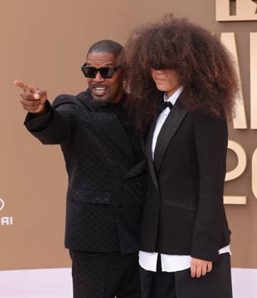 (L-R) Jamie Foxx and Anelise Foxx arrive on the red carpet for 26th annual BET Awards live telecast at the Peacock Theater in Los Angeles on Sunday, June 28, 2026. The BET Awards honors Black entertainers and other people of color in music, film, sports and philanthropy.  LAP20260628314 GREGxGRUDT
