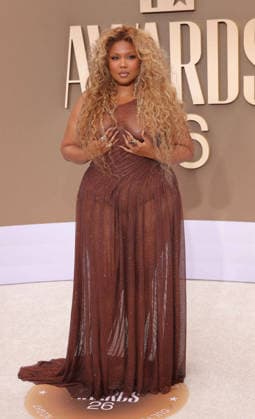 Lizzo arrives on the red carpet for 26th annual BET Awards live telecast at the Peacock Theater in Los Angeles on Sunday, June 28, 2026. The BET Awards honors Black entertainers and other people of color in music, film, sports and philanthropy.  LAP20260628410 GREGxGRUDT