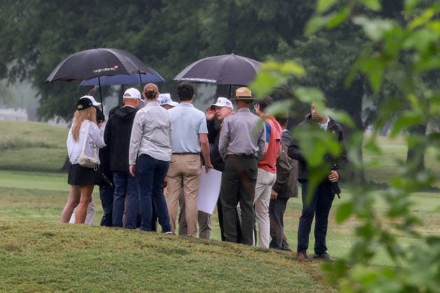 June 28, 2026, Washington, District Of Columbia, USA: United States President Donald J Trump, center, at East Potomac Golf Links in Washington, DC, US, on Sunday, June 28, 2026. President Trump has taken a number of steps to reshape the nation™s capital in his second term, including demolishing the White House East Wing to make way for a new ballroom, planning for the construction of a new triumphal arch, pledging to renovate the John F. Kennedy Center for the Performing Arts, and terminating a contract to run a trio of public golf courses in Washington Washington USA - ZUMAs152 20260628_faa_s152_003 Copyright: xTierneyxLxCrossx-xPoolxviaxCNPx