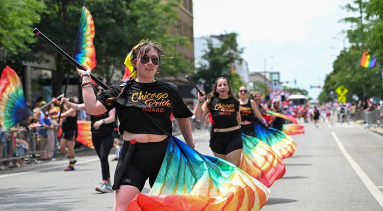 June 28, 2026, Chicago, Illinois, USA: A Chicago Pride Guard member performs a move in sync with her fellow guard performers during Chicago s annual pride parade on Sunday June 28th, 2026. Chicago USA - ZUMAd171 20260628_znp_d171_015 Copyright: xSethxDonovanx