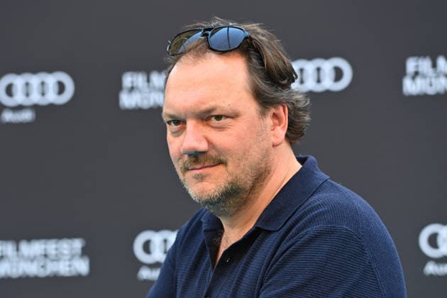 Charly HUEBNER (Schauspieler), Einzelbild,angeschnittenes Einzelmotiv,Portraet,Portrait,Porträt. 43.Filmfest Muenchen Premiere SPAZIERGANG NACH SYRAKUS am 28.06.2026 Deutsches Theater. *** Charly HUEBNER, actor; still image; cropped single shot; portrait; 43rd Munich Film Festival premiere of *A Walk to Syracuse* on June 28, 2026, at the Deutsches Theater
