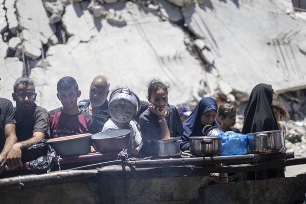 Food distributed to Palestinians in Gaza s Jabalia JABALIA, GAZA, PALESTINE - JUNE 29: Palestinians, including children, wait in line to receive food distributed by a charity organization as food shortage continues due to Israel s blockade and restriction of aid entries into the Gaza Strip, at Jabalia Refugee Camp in northern Gaza, Palestine on June 29, 2026. Mahmoud Abu Hamda Anadolu Jabalia Gaza. Editorial use only. Please get in touch for any other usage.  Copyright: x2026xAnadoluxMahmoudxAbuxHamdax