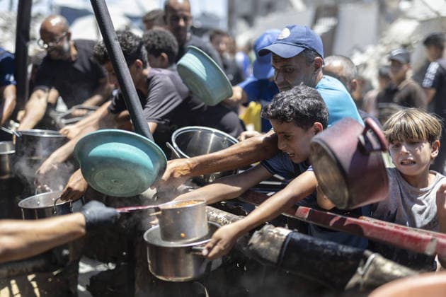 Food distributed to Palestinians in Gaza s Jabalia JABALIA, GAZA, PALESTINE - JUNE 29: Palestinians, including children, wait in line to receive food distributed by a charity organization as food shortage continues due to Israel s blockade and restriction of aid entries into the Gaza Strip, at Jabalia Refugee Camp in northern Gaza, Palestine on June 29, 2026. Mahmoud Abu Hamda Anadolu Jabalia Gaza. Editorial use only. Please get in touch for any other usage.  Copyright: x2026xAnadoluxMahmoudxAbuxHamdax