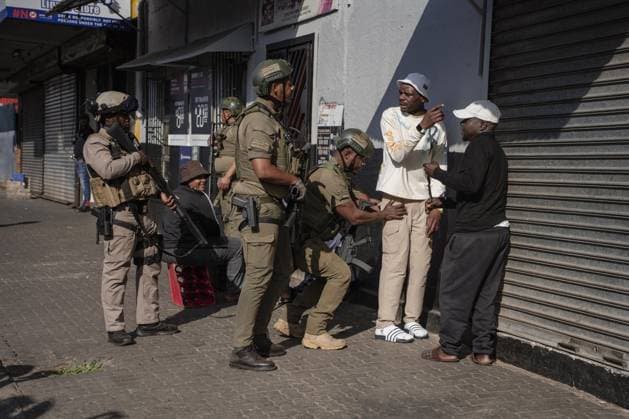 Anti-immigrant demonstrations continue in South Africa SOWETO, SOUTH AFRICA - JUNE 29: Special forces check the ID s of some protesters as hundreds of people gather to protest irregular migrants and called on the government to deport undocumented immigrants in Soweto, in South Africa s Johannesburg province, on June 29, 2026. Anti-immigrant demonstrations are being held across South Africa as growing pressure on foreign nationals in recent months has brought migration, unemployment and security issues back into the national spotlight. Ihsaan Haffejee Anadolu Soweto South Africa. Editorial use only. Please get in touch for any other usage.  Copyright: x2026xAnadoluxIhsaanxHaffejeex