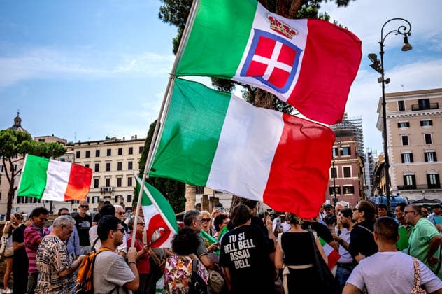 Demonstration for Italy and for Christ against Islam ROME, ITALY - JUNE 29: Demonstrators carrying the monarchist flag and the Italian flag during the demonstration led by Simone Carabella, (not pictured) influencer and anti-urban decay activist, and Mario Adinolfi (not pictured) of the People of the Family movement, in defense of Rome and Italy, faith, the family and the future of their children, defended with the crucifix and the Italian flag, opposing what the organizers describe as the threat of Islam on June 29, 2026 in Rome, Italy. Rome Italy Copyright: xStefanoxMontesix