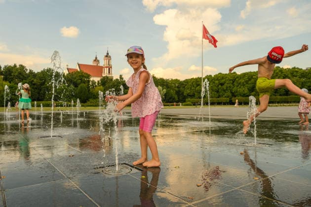 Hot weather hits Vilnius VILNIUS, LITHUANIA - JUNE 29: A child plays in a fountain as temperatures climb close to 33 degrees Celsius during a heatwave in Vilnius, Lithuania, on June 29, 2026. Residents sought relief from the hot weather in fountains, parks and other public spaces as the prolonged heatwave continued across the country. Yauhen Yerchak Anadolu Vilnius Lithuania. Editorial use only. Please get in touch for any other usage.  Copyright: x2026xAnadoluxYauhenxYerchakx