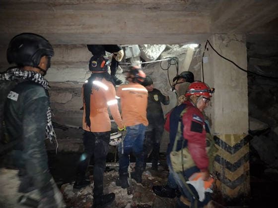 Search and rescue teams continue efforts to locate survivors trapped beneath the rubble of collapsed residential buildings in affected areas following the powerful 7.2‘magnitude earthquake that struck Venezuela and parts of the Caribbean on June 29, 2026. The death toll has risen to over 1,400, with more than 3,000 injured, while authorities report that over 70,000 people remain missing.  VAN2026062910 GovernmentxMinistryxofxInformati