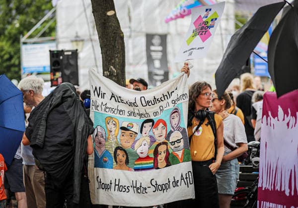 June 29, 2026, Berlin, Berlin, Germany: BERLIN, GERMANY Ã¢â‚¬ JUNE 29, 2026: Counter-demonstrators gather at Alexanderplatz during a protest against the far-right Alternative for Germany (AfD) party, while AfD supporters hold a nearby rally under a heavy police presence. Demonstrators carried banners calling for a ban on the AfD, anti-fascist slogans, LGBTQ+ pride flags and anti-racism messages as officers separated the opposing groups in central Berlin. ZUMA Press Wire Berlin Germany - ZUMAa268 20260629_zip_a268_003 Copyright: xAbdelrahmanxAlkahloutx