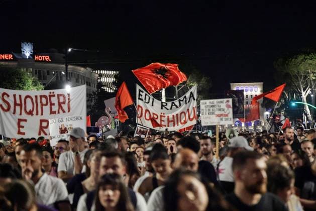 Protests Against Kushner-Linked Development Enter 30th Day in Tirana TIRANA, ALBANIA JUNE 29, 2026: Demonstrators gathered in Tirana during the thirtieth consecutive day of protests against a proposed luxury tourism development project linked to Jared Kushner. Student protesters briefly unfurled a giant banner from the facade of the University of Tirana reading Students: Your Time Is Up alongside the slogan Albania Is Not for Sale before university security removed it. Protesters then marched to the university, where the banner was displayed again following a tense verbal confrontation with security personnel before eventually being taken down and carried through the demonstration. The protest was also attended by several Me Copyright: x xVlasovxSulajx xJNAxPressx