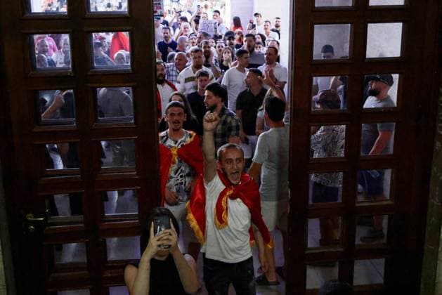 Protests Against Kushner-Linked Development Enter 30th Day in Tirana TIRANA, ALBANIA JUNE 29, 2026: Demonstrators gathered in Tirana during the thirtieth consecutive day of protests against a proposed luxury tourism development project linked to Jared Kushner. Student protesters briefly unfurled a giant banner from the facade of the University of Tirana reading Students: Your Time Is Up alongside the slogan Albania Is Not for Sale before university security removed it. Protesters then marched to the university, where the banner was displayed again following a tense verbal confrontation with security personnel before eventually being taken down and carried through the demonstration. The protest was also attended by several Me Copyright: x xVlasovxSulajx xJNAxPressx