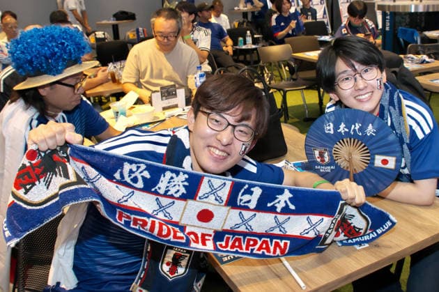 Japanese supporters pose for camera during the public viewing for the FIFA World Cup 2026 match between Japan and Brazil at the JFA(Japan Football Association) soccer culture hub blue-ing! in Tokyo, Japan on Tuesday, June 30, 2026.  TKP2026063001 KEIZOxMORI