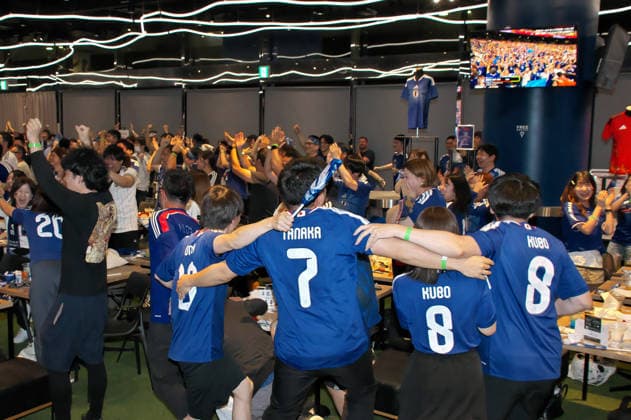 Japanese supporters celebrate after scoring a goal during the public viewing for the FIFA World Cup 2026 match between Japan and Brazil at the JFA(Japan Football Association) soccer culture hub blue-ing! in Tokyo, Japan on Tuesday, June 30, 2026.  TKP2026063012 KEIZOxMORI