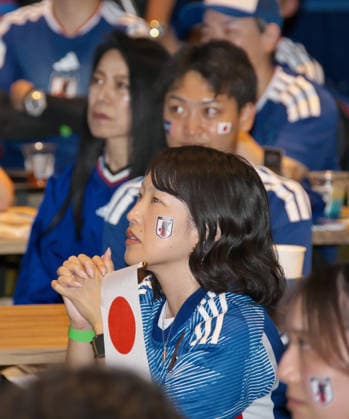 Japanese supporters pray for players after Brazil scoring a goal during the public viewing for the FIFA World Cup 2026 match between Japan and Brazil at the JFA(Japan Football Association) soccer culture hub blue-ing! in Tokyo, Japan on Tuesday, June 30, 2026.  TKP2026063014 KEIZOxMORI