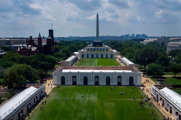 The Washington Monument is seen as visitors attend the fifth day of the Great American State Fair on the National Mall on Monday, June 29, 2026. The Freedom 250-backed Great American State Fair celebrating the 250th anniversary of the United States runs through July 10th.  WAP20260629395 BONNIExCASH