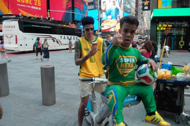 Daily Life in New York City, US - 29 Jun 2026 Fans of the Brazilian soccer team sit on a bicycle in Times Square, Manhattan, New York City. New York United States Copyright: xJiminxKimx xSOPAxImagesx JKIM_daily_life_nyc_jun_29_26_DSC6968.jpeg