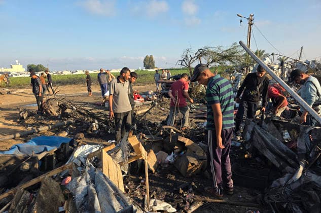 Displaced Families Inspect Damage After Israeli Airstrike in al-Mawasi Palestinian displaced families inspect damage to their tents and belongings following an Israeli airstrike that targeted a camp for displaced people in the al-Mawasi area of Khan Younis, southern Gaza Strip, on June 30, 2026. The Israeli army carried out the strike despite a ceasefire, causing extensive damage across the area. Photo by Tariq Mohammad APA Images Khan Yunis Gaza Strip Palestinian Territory 300626_Khan_Yunis_TM_00(36) Copyright: xapaimagesxTariqxMohammad xapaimagesx