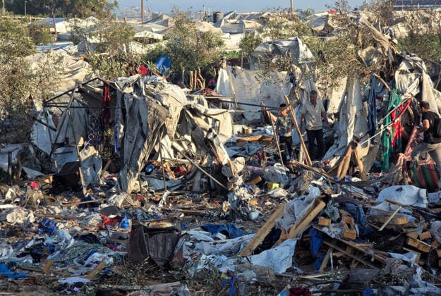 Displaced Families Inspect Damage After Israeli Airstrike in al-Mawasi Palestinian displaced families inspect damage to their tents and belongings following an Israeli airstrike that targeted a camp for displaced people in the al-Mawasi area of Khan Younis, southern Gaza Strip, on June 30, 2026. The Israeli army carried out the strike despite a ceasefire, causing extensive damage across the area. Photo by Tariq Mohammad APA Images Khan Yunis Gaza Strip Palestinian Territory 300626_Khan_Yunis_TM_00(22) Copyright: xapaimagesxTariqxMohammad xapaimagesx