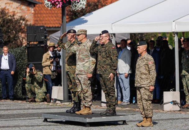 Valga, 30.06.2026. The 1 German Netherlands Corps (1GNC) officially assume tactical command of the Estonian and Latvian land forces from Multinational Corps Northeast. The ceremony was held on Valga Central Square. The ceremony was attended by Estonian Minister of Defence Hanno Pevkur, German Minister of Defence Boris Pistorius, Dutch Minister of Defence Dilan YeÅüilgöz, Latvian Minister of Defence Raivis Melnis, as well as senior military leaders from NATO and member states. Photo Arvo Meeks, Louna-Eesti Postimees Valga Valgamaa Estonia 2MA30juuni2026A007  Copyright: xArvoxMeeksx Military officers lined up
