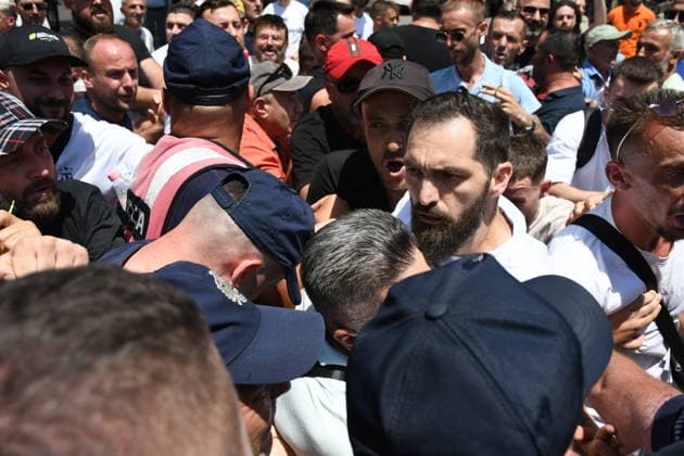 Protest held in front of Parliament building against tourism projects in Tirana TIRANA, ALBANIA - JUNE 30: Demonstrators gather in front of the Parliament building to protest against a planned tourism project in the Zvernec area of Vlora, in Tirana, Albania on June 30, 2026. Scuffles broke out between police and protestors during the demonstration, which has been ongoing for a month. Reinforcements arrived at the protest area to form a security cordon. Olsi Shehu Anadolu Tirana Albania. Editorial use only. Please get in touch for any other usage.  Copyright: x2026xAnadoluxOlsixShehux