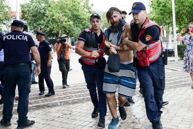Police and Protesters Clash Outside Albanian Parliament TIRANA, ALBANIA JUNE 30, 2026: Demonstrators gathered outside the Albanian Parliament in Tirana during a new phase of the ongoing protests against a proposed luxury tourism development project linked to Jared Kushner. Protesters confronted lawmakers as they arrived for and departed from the parliamentary session, chanting slogans accusing members of parliament of failing to represent citizens and throwing eggs toward official vehicles. Police intervened after tensions escalated, using pepper spray and detaining several demonstrators during brief clashes outside the parliament building. The protest movement later continued with its daily evening demonstration outside the Prime Minis Copyright: x xVlasovxSulajx xJNAxPressx
