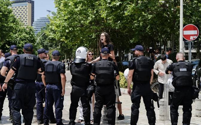 Police and Protesters Clash Outside Albanian Parliament TIRANA, ALBANIA JUNE 30, 2026: Demonstrators gathered outside the Albanian Parliament in Tirana during a new phase of the ongoing protests against a proposed luxury tourism development project linked to Jared Kushner. Protesters confronted lawmakers as they arrived for and departed from the parliamentary session, chanting slogans accusing members of parliament of failing to represent citizens and throwing eggs toward official vehicles. Police intervened after tensions escalated, using pepper spray and detaining several demonstrators during brief clashes outside the parliament building. The protest movement later continued with its daily evening demonstration outside the Prime Minis Copyright: x xVlasovxSulajx xJNAxPressx