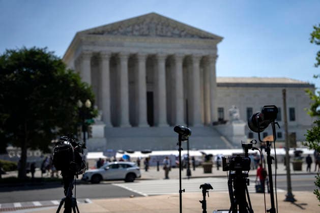 News teams set up outside the Supreme Court of the United States in Washington, DC as the court releases their final opinions before summer recess on Tuesday, June 30, 2026. The court upheld birthright citizenship, and also state laws banning transgender women and girls from playing on school athletic teams.  WAP20260630436 BONNIExCASH