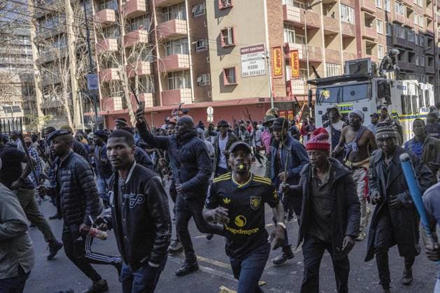 Anti-immigrant demonstrations continue in South Africa JOHANNESBURG, SOUTH AFRICA - JUNE 30: Hundreds of people gather to protest irregular migrants and call on the government to deport undocumented immigrants in Johannesburg, South Africa on June 30, 2026. Anti-immigrant demonstrations are being held across South Africa as growing pressure on foreign nationals in recent months has brought migration, unemployment and security issues back into the national spotlight. Ihsaan Haffejee Anadolu Johannesburg South Africa. Editorial use only. Please get in touch for any other usage.  Copyright: x2026xAnadoluxIhsaanxHaffejeex