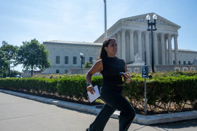 June 30, 2026, Washington, Dc, United States: Interns working for media outlets run paper copies of Superme Court decisions to the on-air analysts outside of the Supreme Court on June 30, 2026. Despite digital options, the Ã¢â‚¬oerunning of the internsÃ¢â‚¬Â? occurs annually at the Supreme Court at the end of the term. Washington United States - ZUMAl312 20260630_znp_l312_005 Copyright: xAndrewxLeydenx