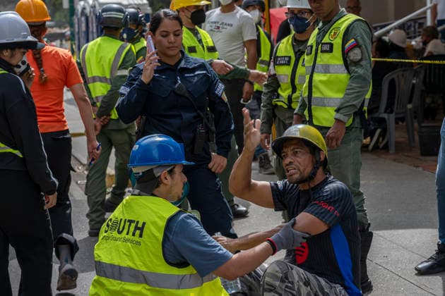 June 30, 2026, Caracas, Miranda, Venezuela: A man screams in despair during a rescue operation at a building that collapsed in the earthquake..Caracas, Venezuela, was hit by two powerful earthquakes. June, 30, 2026 Caracas Venezuela - ZUMAv125 20260630_zip_v125_002 Copyright: xJimmyxVillaltax