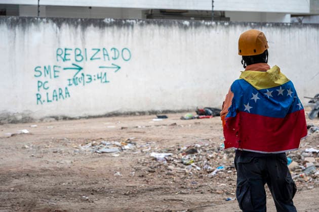 June 30, 2026, Caracas, Miranda, Venezuela: A Venezuelan rescue worker at the entrance to a building that collapsed in the earthquake..Caracas, Venezuela, was hit by two powerful earthquakes. June, 30, 2026 Caracas Venezuela - ZUMAv125 20260630_zip_v125_014 Copyright: xJimmyxVillaltax