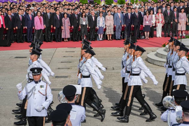 HONG KONG-DAILY HKSAR-ANNIVERSARY The flag party and guard of honor march out following the conclusion of the flag-raising ceremony at Golden Bauhinia Square on July 1, 2026 in Hong Kong. (Photo by Kevin Li TMHK via Nexpher Images) Hong Kong