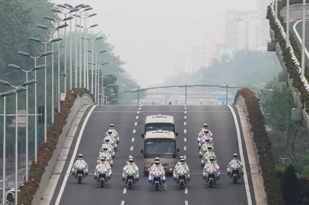 (260701) -- BEIJING, July 1, 2026 -- The motorcade carrying recipients of the July 1 Medal is accompanied by motorcycle escorts on the way to the Great Hall of the People in Beijing, capital of China, July 1, 2026. China will hold a gathering to celebrate the 105th founding anniversary of the Communist Party of China (CPC) at 10 a.m. Wednesday at the Great Hall of the People in Beijing. ) FOCUS China to hold gathering marking CPC s 105th founding anniversary WangxYe 