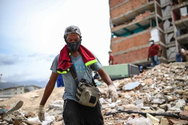 Search operations and salvage efforts continue amid rubble in La Guaira, Venezuela LA GUAIRA, VENEZUELA - JUNE 30: Earthquake survivors try to salvage what is left of their belongings from the debris and collapsed concrete structures, in La Guaira, Venezuela, on June 30, 2026. The popular coastal neighborhoods of Carabellada and Caribe, once favorites among vacationers, have been turned into piles of rubble in La Guaira, the city most affected by the earthquakes in Venezuela, revealing the true horror of the disaster while search and rescue operations continue in the region. Cem Tekkesinoglu Anadolu La Guaira Venezuela. Editorial use only. Please get in touch for any other usage.  Copyright: x2026xAnadoluxCemxTekkesinoglux