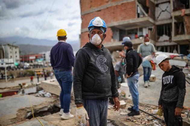 Search operations and salvage efforts continue amid rubble in La Guaira, Venezuela LA GUAIRA, VENEZUELA - JUNE 30: Earthquake survivors try to salvage what is left of their belongings from the debris and collapsed concrete structures, in La Guaira, Venezuela, on June 30, 2026. The popular coastal neighborhoods of Carabellada and Caribe, once favorites among vacationers, have been turned into piles of rubble in La Guaira, the city most affected by the earthquakes in Venezuela, revealing the true horror of the disaster while search and rescue operations continue in the region. Cem Tekkesinoglu Anadolu La Guaira Venezuela. Editorial use only. Please get in touch for any other usage.  Copyright: x2026xAnadoluxCemxTekkesinoglux