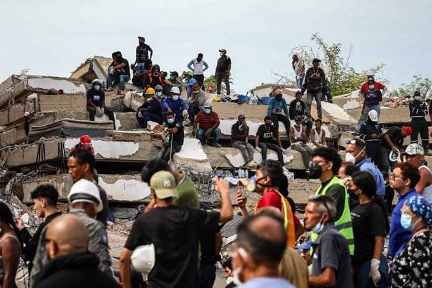 Search operations and salvage efforts continue amid rubble in La Guaira, Venezuela LA GUAIRA, VENEZUELA - JUNE 30: Earthquake survivors try to salvage what is left of their belongings from the debris and collapsed concrete structures, in La Guaira, Venezuela, on June 30, 2026. The popular coastal neighborhoods of Carabellada and Caribe, once favorites among vacationers, have been turned into piles of rubble in La Guaira, the city most affected by the earthquakes in Venezuela, revealing the true horror of the disaster while search and rescue operations continue in the region. Cem Tekkesinoglu Anadolu La Guaira Venezuela. Editorial use only. Please get in touch for any other usage.  Copyright: x2026xAnadoluxCemxTekkesinoglux