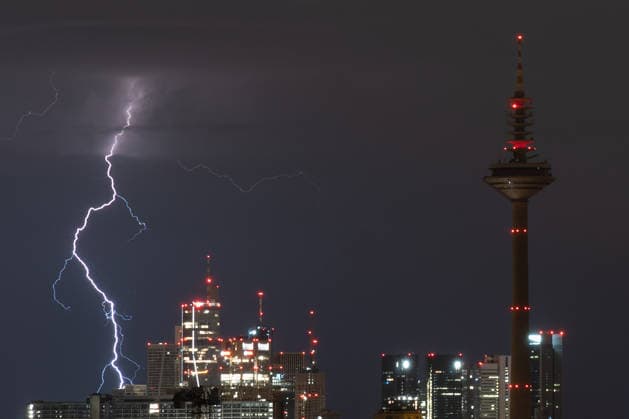 July 1, 2026, Frankfurt, Hesse, Germany: Lightning strikes over the skyline of the financial district in Frankfurt am Main, Germany. Frankfurt Germany  - ZUMAb332 20260701_zip_b332_002 Copyright: xMatiasxBasualdox