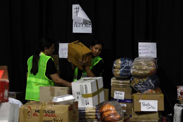 June 30, 2026, Valencia, Carabobo, Venezuela: June 30, 2026. Volunteers work to sort supplies at a collection center in the city of Valencia, Carabobo state. Photo: Juan Carlos Hernandez Valencia Venezuela - ZUMAhe3_ 20260630_abp_he3_011 Copyright: xJuanxCarlosxHernandezx