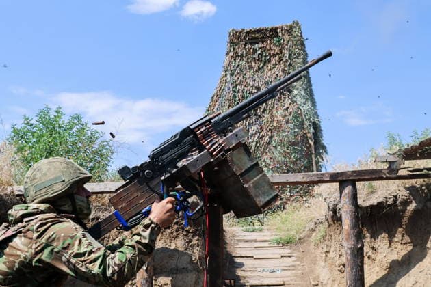 RUSSIA, ZAPOROZHYE REGION - JUNE 30, 2026: A serviceman of Russia s Dnepr Group of Forces conducts air surveillance on the Zaporozhye front of Russia s special military operation. Alexander Polegenko TASS  94533084