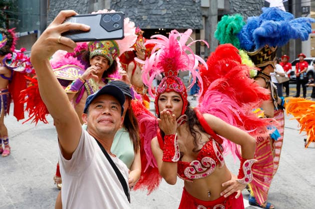 Dancers perform samba show summer festival in Seoul Dancers from Lotte World, a South Korean theme park, pose for photos with visitors after performing a samba show during a summer festival promotional event in the Myeongdong shopping district in Seoul, South Korea, on July 01, 2026. Seoul South Korea  Copyright: xMatrixxImagesx xJungxUi-Chelx