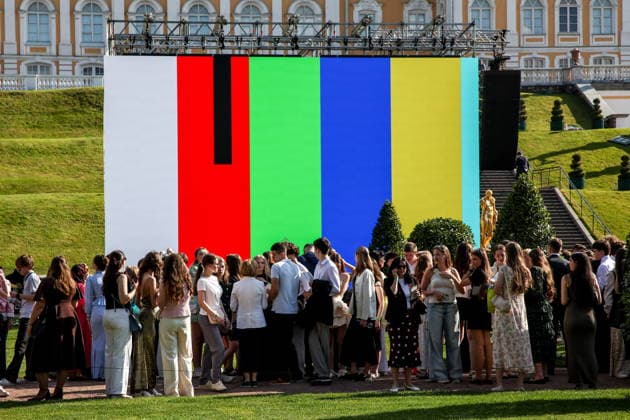 RUSSIA, ST PETERSBURG - JUNE 30, 2026: Young people attend an annual ball held at the Peterhof State Museum Reserve for school leavers awarded gold medals for academic excellence. Peter Kovalev TASS  94535097