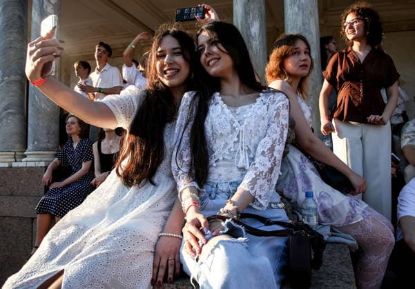 RUSSIA, ST PETERSBURG - JUNE 30, 2026: Young people attend an annual ball held at the Peterhof State Museum Reserve for school leavers awarded gold medals for academic excellence. Peter Kovalev TASS  94535257