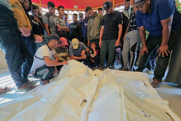 Mourners bid farewell to two Palestinians at Nasser Medical Complex Mourners bid farewell to the bodies of two Palestinians at Nasser Medical Complex in Khan Younis, southern Gaza Strip, on July 1, 2026, after they were killed in an Israeli airstrike that targeted a group of people near the Asdaa junction in the al-Mawasi area of Khan Younis the previous evening. Photo by Tariq Mohammad APA Images Khan Yunis Gaza Strip Palestinian Territory 010726_Khan_Yunis_TM_01(4) Copyright: xapaimagesxTariqxMohammad xapaimagesx