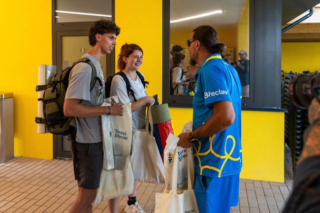 July 1, 2026, Breclav, South Moravia, Czech Republic: David Bartal, a representative of Tereza Breclav, welcomes the first visitors and presents them with gift bags during the reopening of the municipal outdoor swimming pool in Breclav, Czech Republic, on July 1, 2026. The outdoor facility reopened after approximately 18 months of reconstruction as part of a CZK 530 million redevelopment project that also includes a new indoor swimming pool scheduled for completion in early 2027. Breclav Czech Republic - ZUMAc315 20260701_zsp_c315_009 Copyright: xMichaelxCabalx