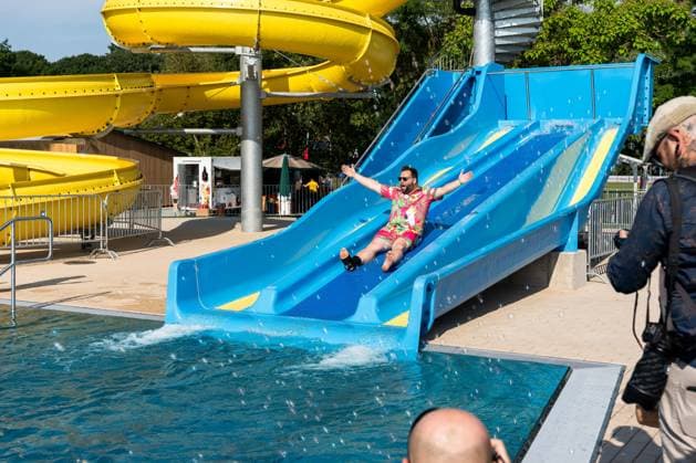 July 1, 2026, Breclav, South Moravia, Czech Republic: Breclav Deputy Mayor JAKUB MATUSKA rides down a water slide during the reopening ceremony of the municipal outdoor swimming pool in Breclav, Czech Republic, on July 1, 2026. The outdoor facility reopened after approximately 18 months of construction as part of a CZK 530 million redevelopment project that also includes a new indoor swimming pool scheduled for completion in early 2027. Breclav Czech Republic - ZUMAc315 20260701_zsp_c315_017 Copyright: xMichaelxCabalx