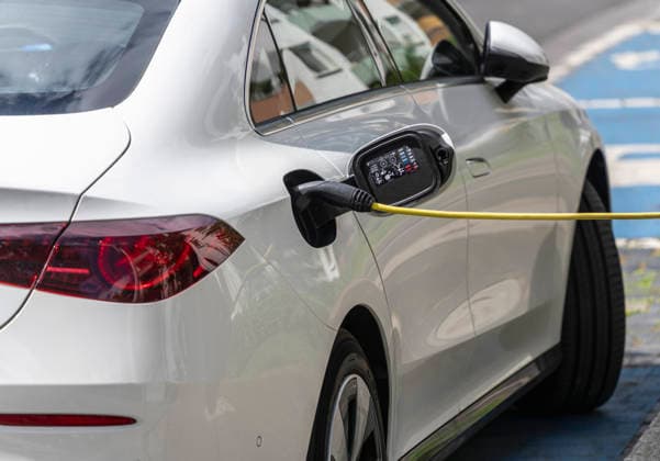 Electric car will to the Charging Station charged, Berlin, Germany 1020931940