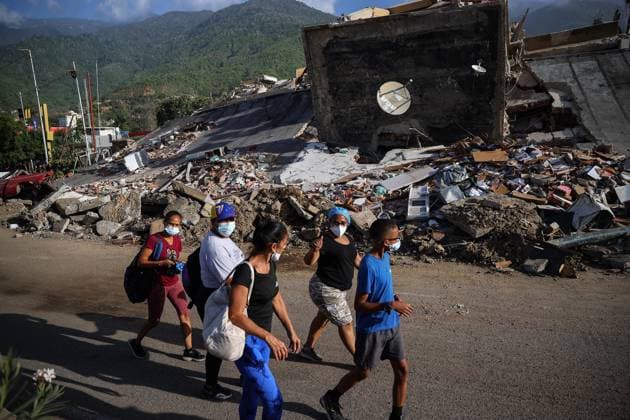 Devastation in La Guaira s coastal neighborhoods after Venezuela earthquakes LA GUAIRA, VENEZUELA - JULY 2: A general view shows the popular coastal neighborhoods of Carabellada and Caribe, once favorites among vacationers, turned into piles of rubble in La Guaira, the city most affected by the earthquakes in Venezuela, revealing the true horror of the disaster on July 2, 2026. Cem Tekkesinoglu Anadolu La Guaira Venezuela. Editorial use only. Please get in touch for any other usage.  Copyright: x2026xAnadoluxCemxTekkesinoglux